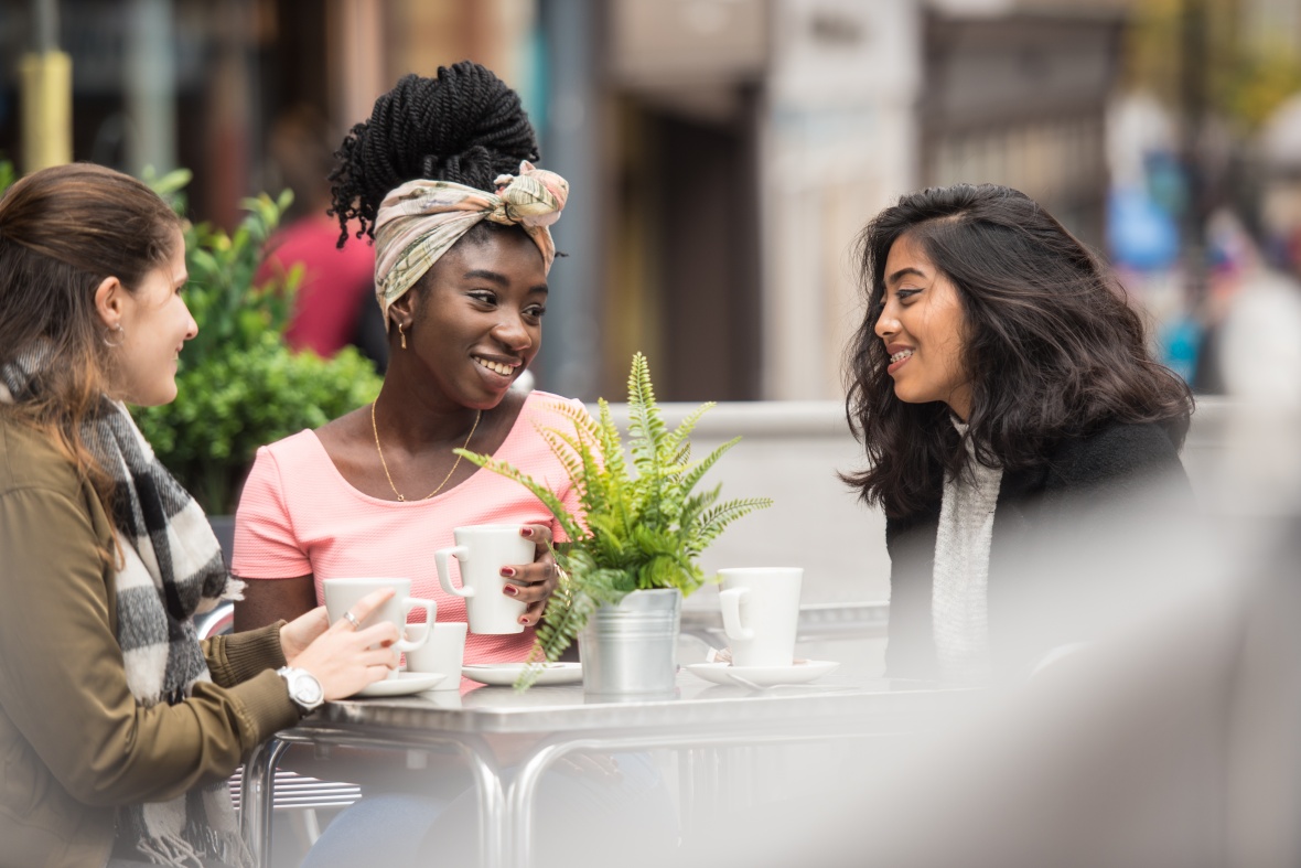 Students talking and socialising in the city centre