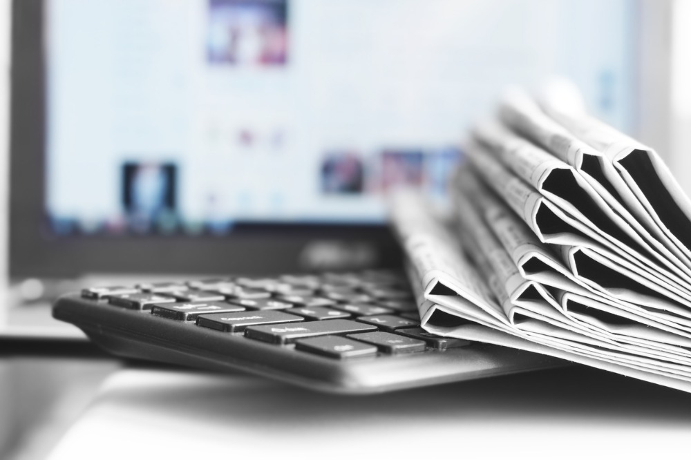 An image of a man recording educational video webinar