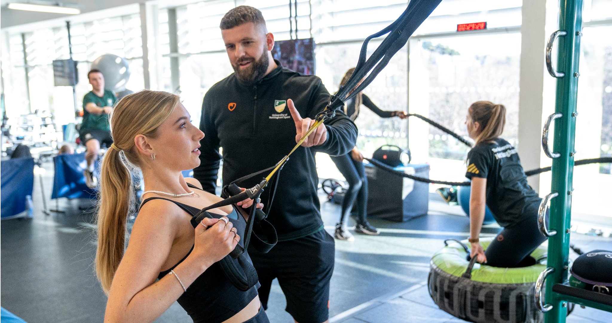A personal training session taking place at David Ross Sports Village Fitness Suite