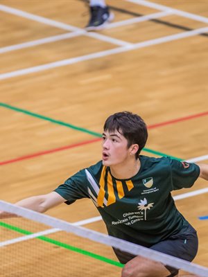 Student playing badminton
