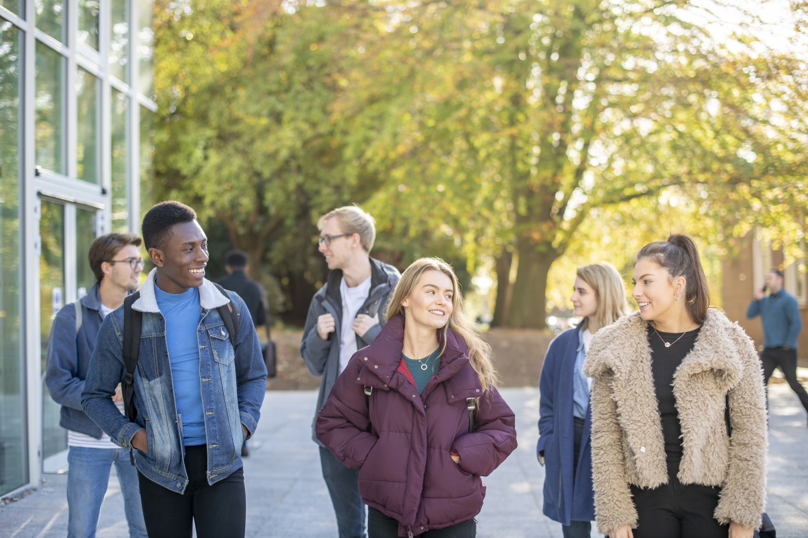 Group of students walking on campus