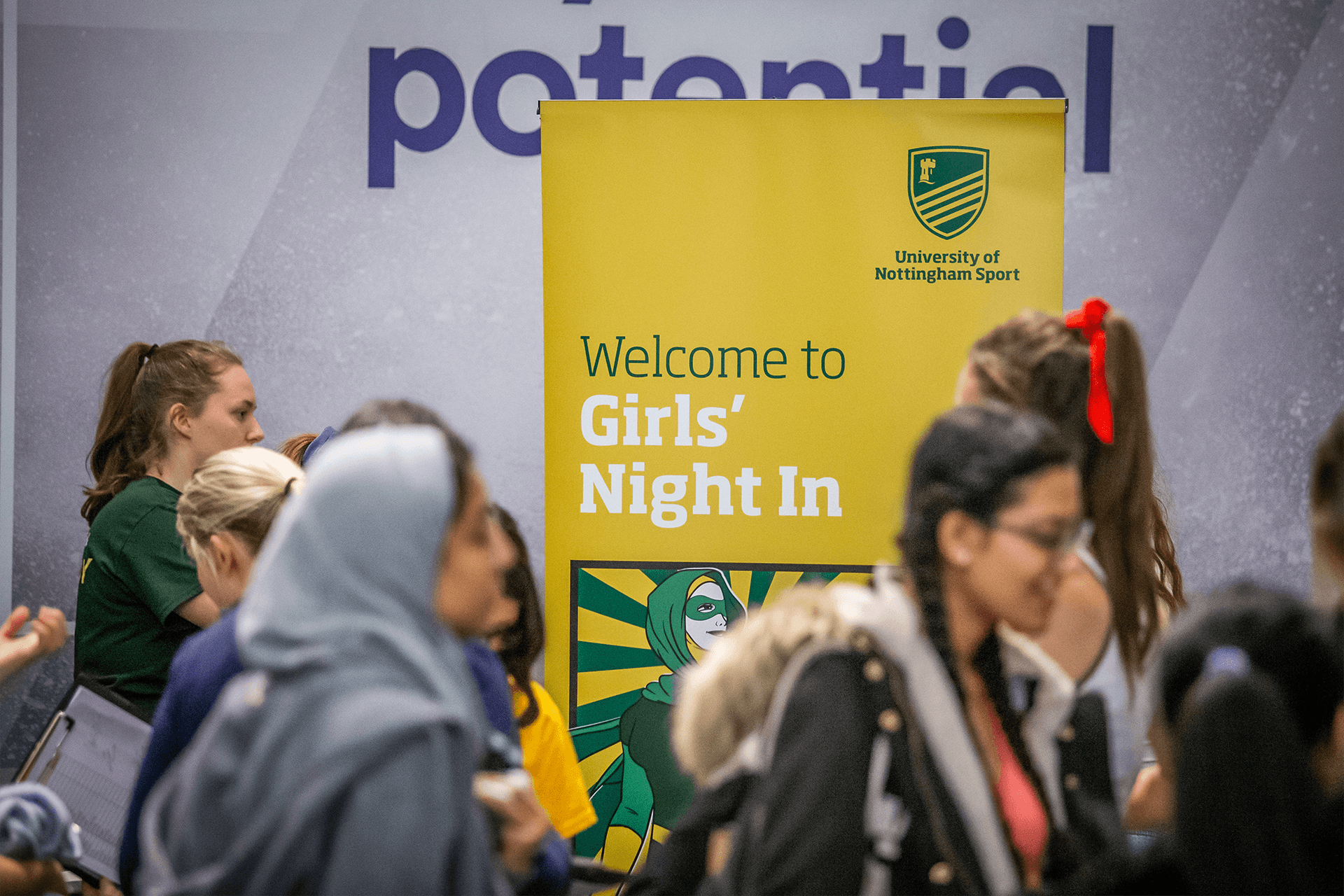 Banner advertising Girls Night In the annual female student sport and activity event